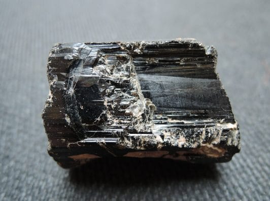 Black tourmaline is beneficial for the root chakra Black tourmaline is beneficial for the root chakra, as it clears negative energies