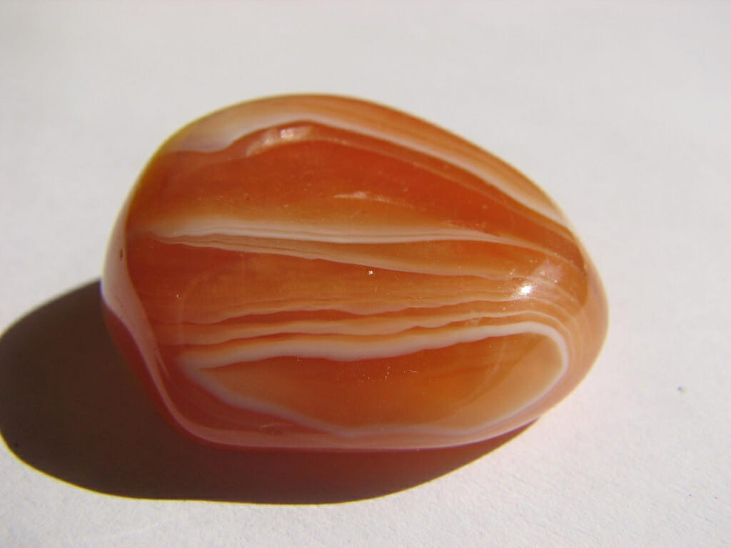 Carnelian balances the root chakra by encouraging creativity and personal advancement