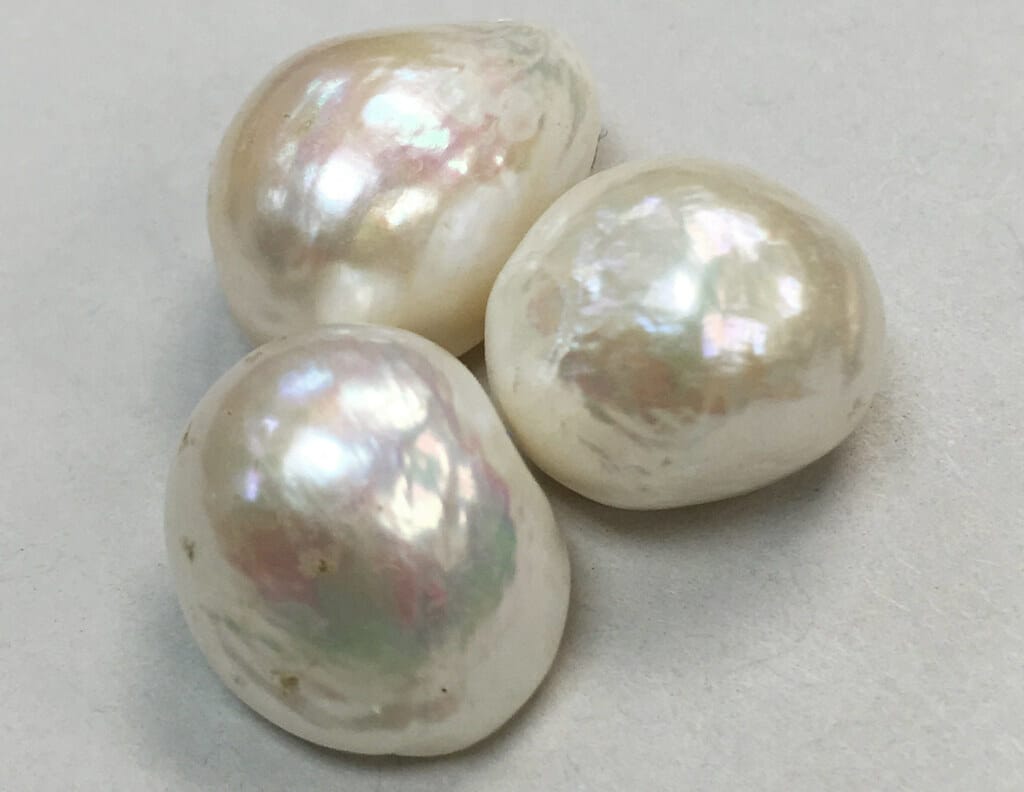 Pearls are thought to balance emotions and alleviate stress, promoting a sense of tranquility and inner peace
