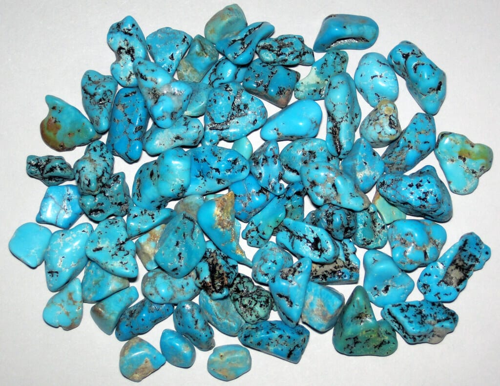 Turquoise is believed to enhance communication and self-expression, assisting in clear and effective communication with others