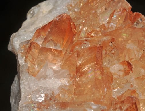Tangerine quartz supports sacral chakra health by fostering endurance, bravery, and resolve