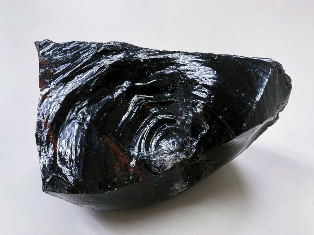 Black obsidian is a grounding stone Black obsidian is a grounding stone that promotes self-awareness and emotional healing